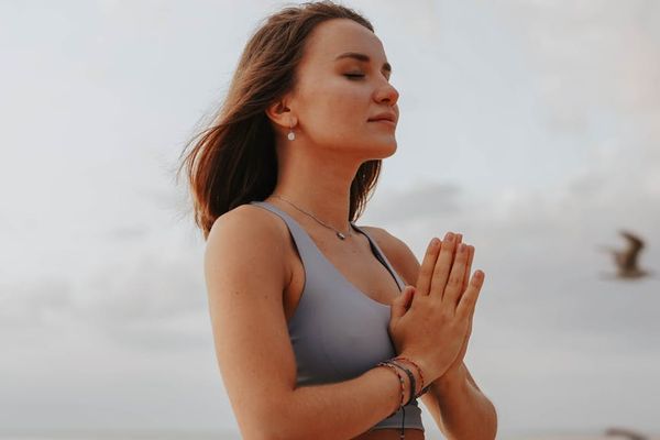 Close up of a person focused on deep breathing exercises