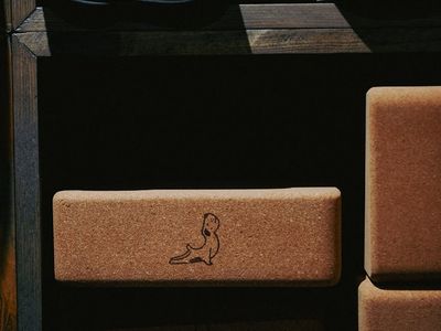 Detail of yoga mats and blocks neatly arranged